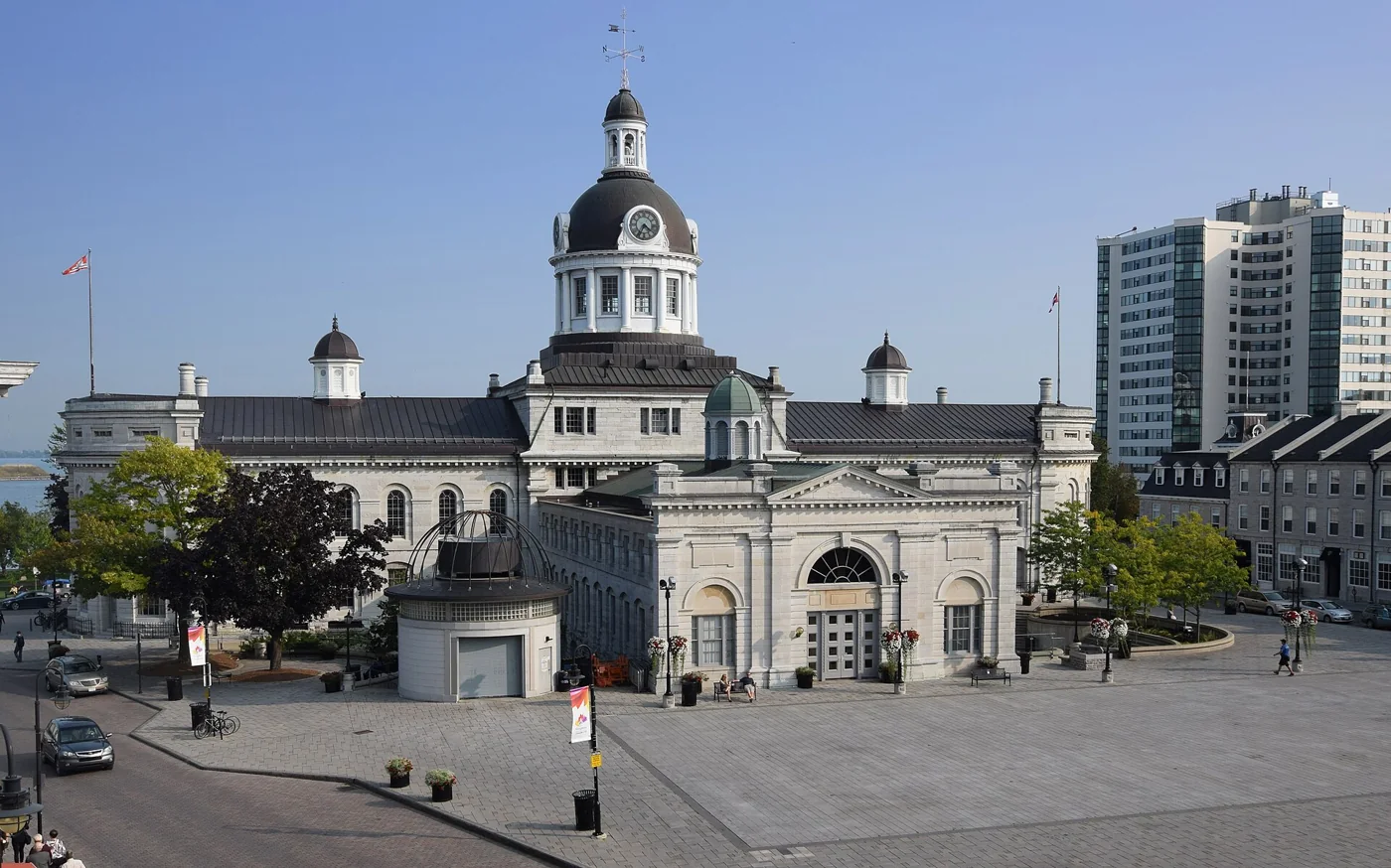 Historic grey limestone buildings in downtown Kingston, Ontario at golden hour